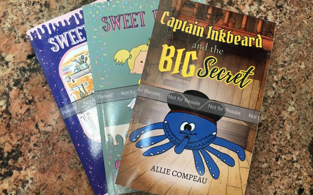 Stack of KDP proof copies for children's books before publication review